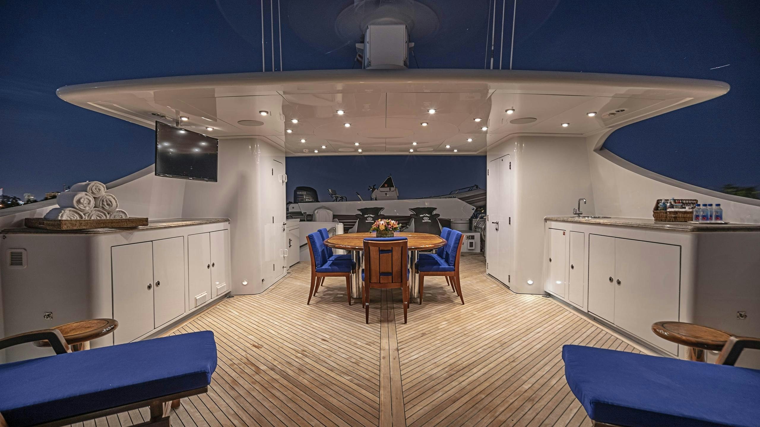 a room with a table and chairs aboard MISS CHRISTINE Yacht for Charter