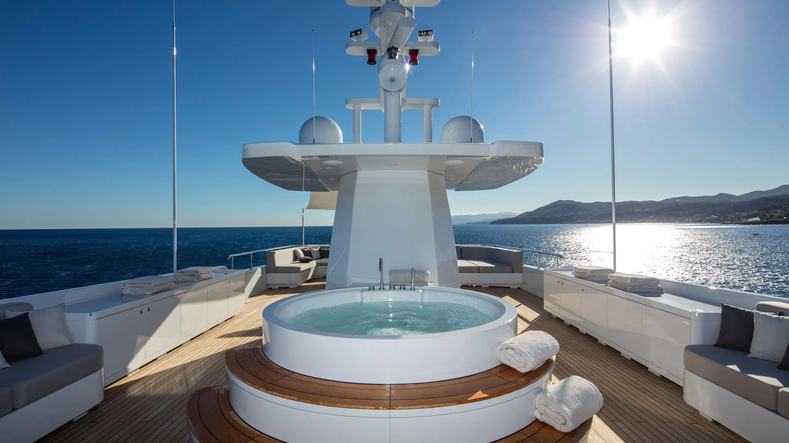 a large white tub in a room with a white wall and a white tub aboard ALALYA Yacht for Charter