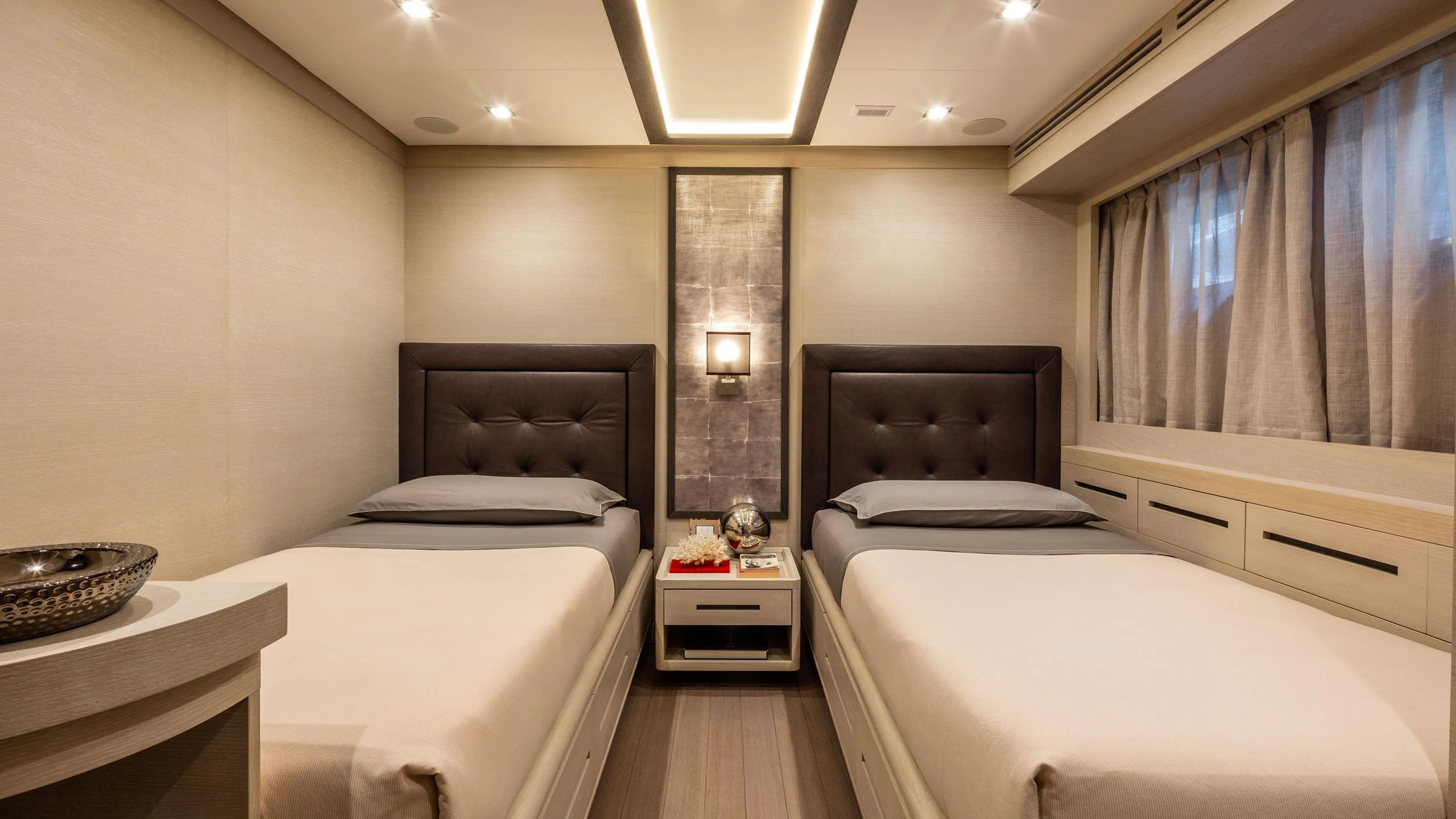 a room with two beds aboard ALALYA Yacht for Charter