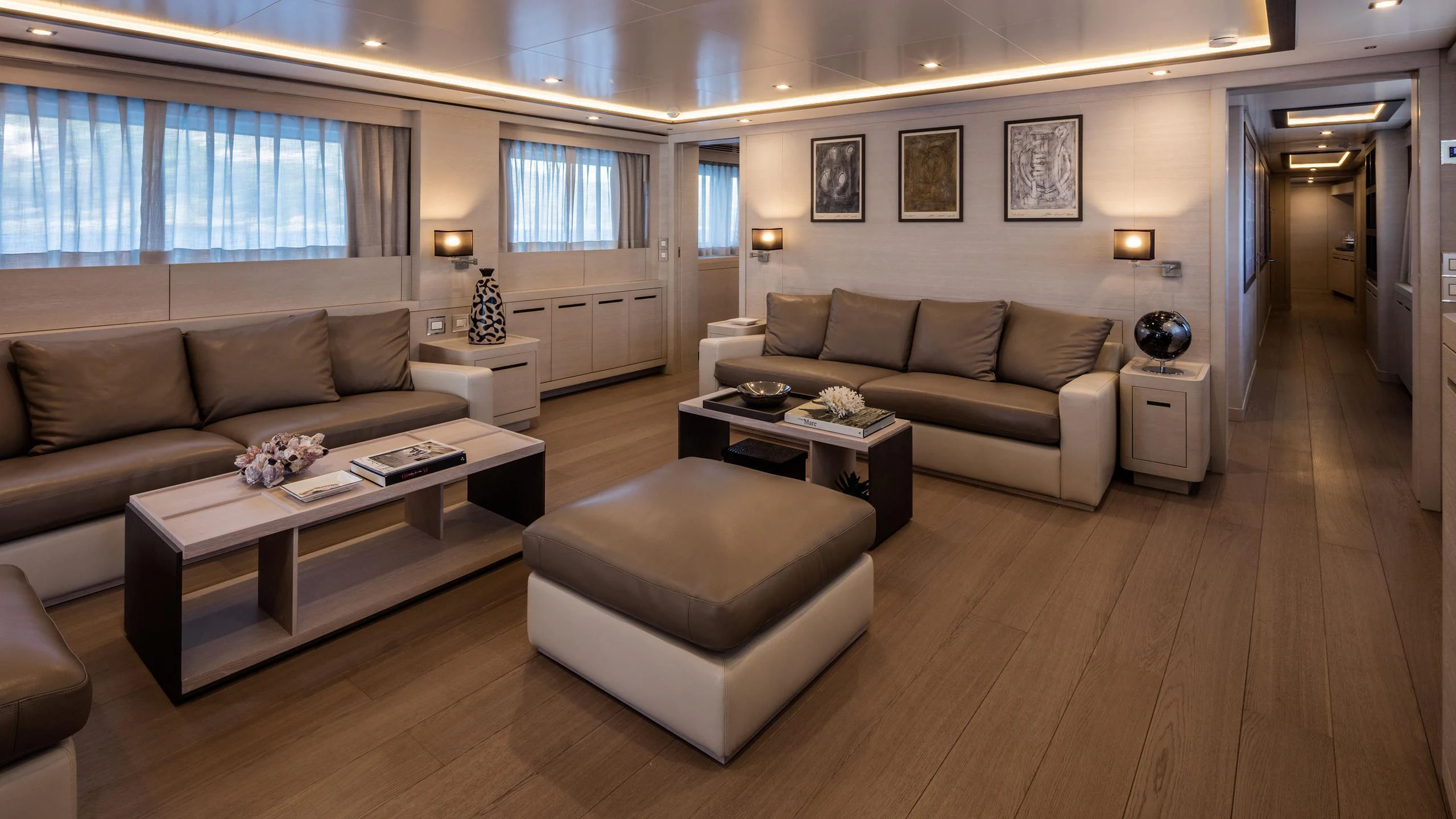 a living room with a couch and a coffee table aboard ALALYA Yacht for Charter