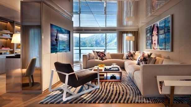a living room with a couch and a table aboard ORIENT STAR Yacht for Charter