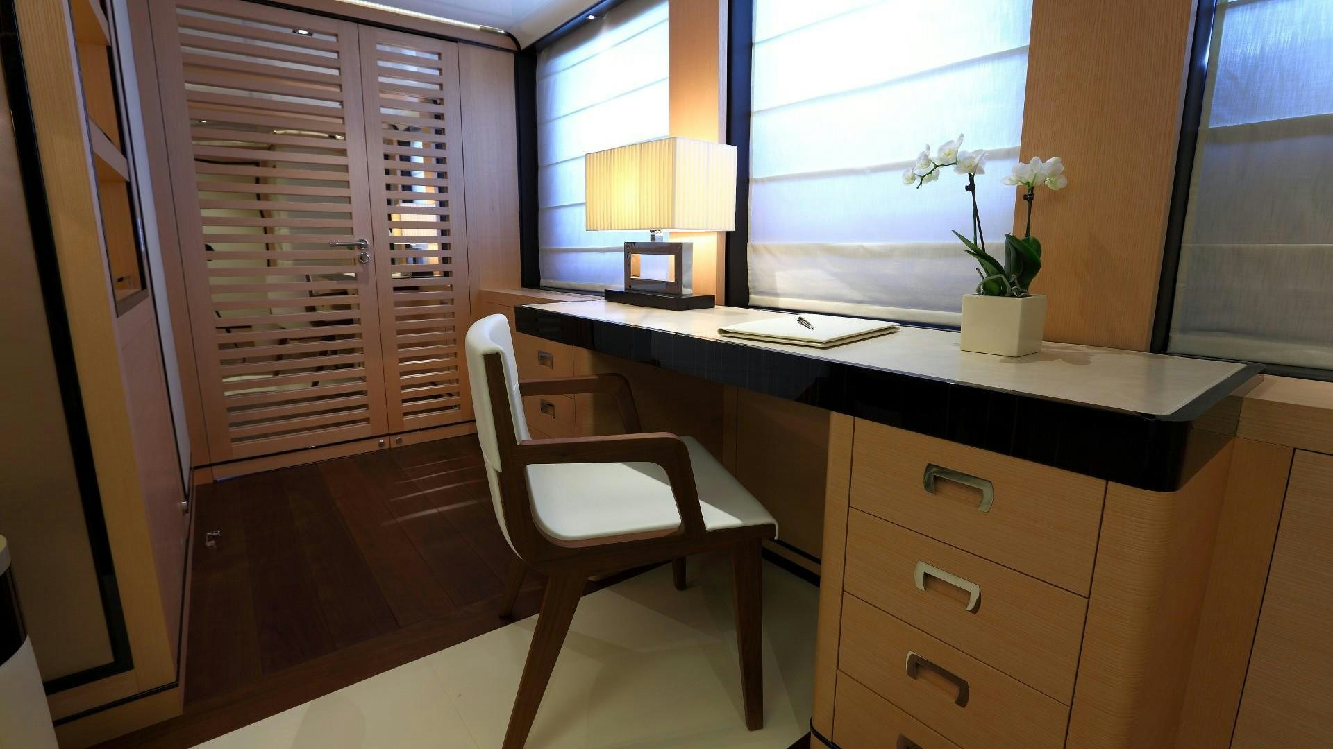 a desk in a room aboard 2 LADIES Yacht for Charter