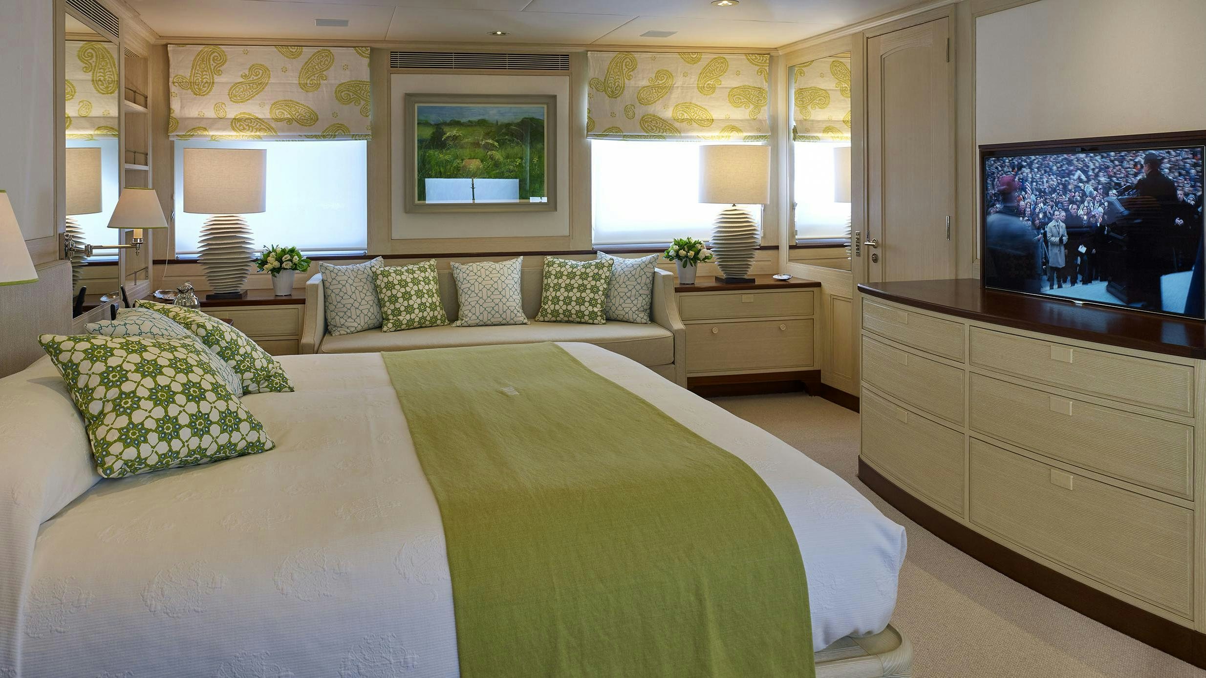 a large bed in a room aboard ANCALLIA Yacht for Charter