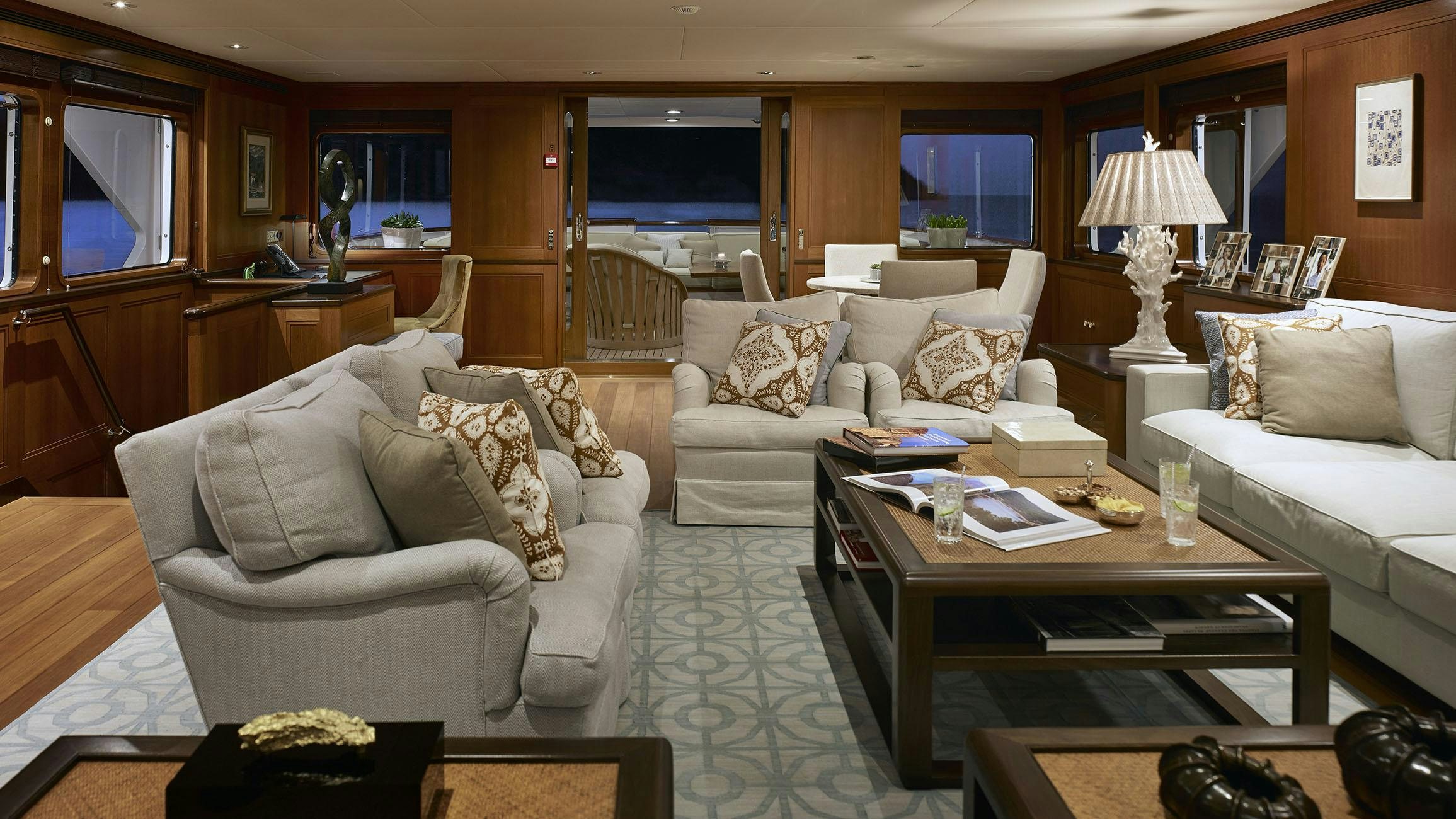 a living room with a couch and a coffee table aboard ANCALLIA Yacht for Charter