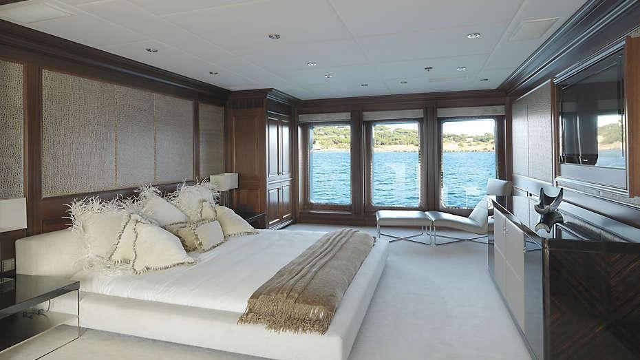 a large bedroom with a large bed aboard MY LITTLE VIOLET Yacht for Charter