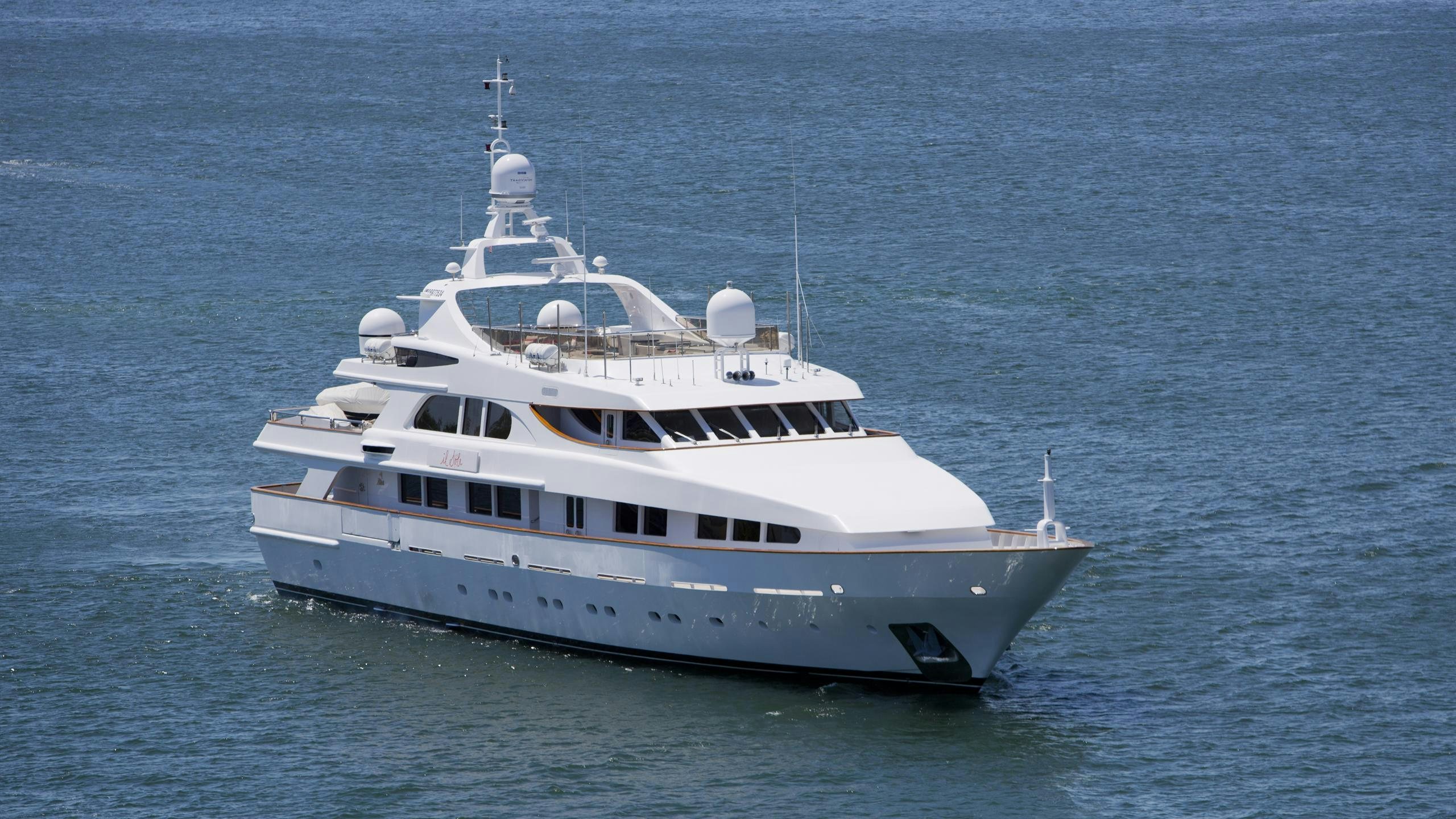 a large white boat in the water aboard IL SOLE Yacht for Charter
