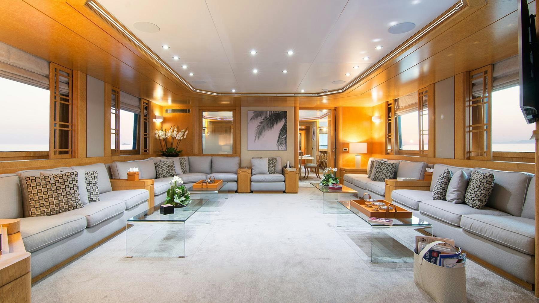 a living room with a large white rug and a large white rug aboard BELLA STELLA Yacht for Charter