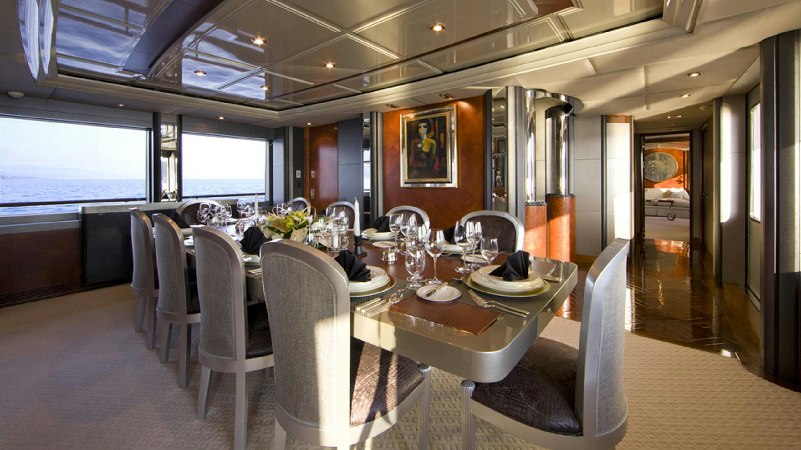 a dining room with a table and chairs aboard SILVER DREAM Yacht for Charter