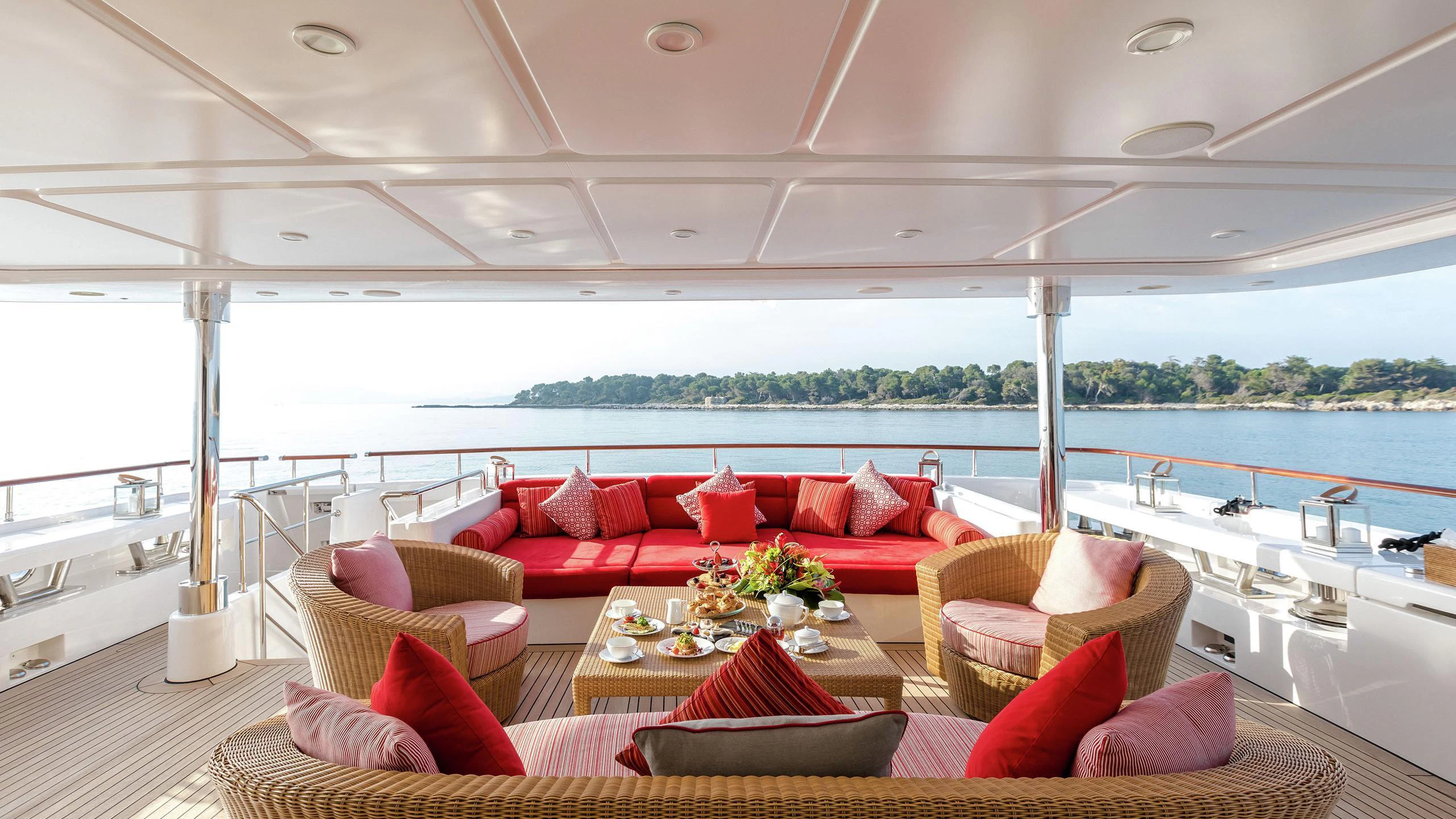 a living room with a large window aboard EMOTION 2 Yacht for Charter