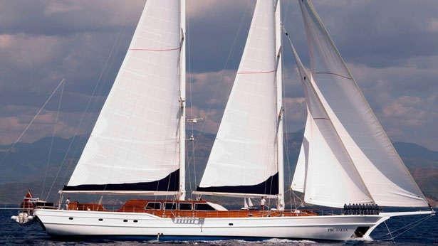 a large white boat aboard HIC SALTA Yacht for Charter