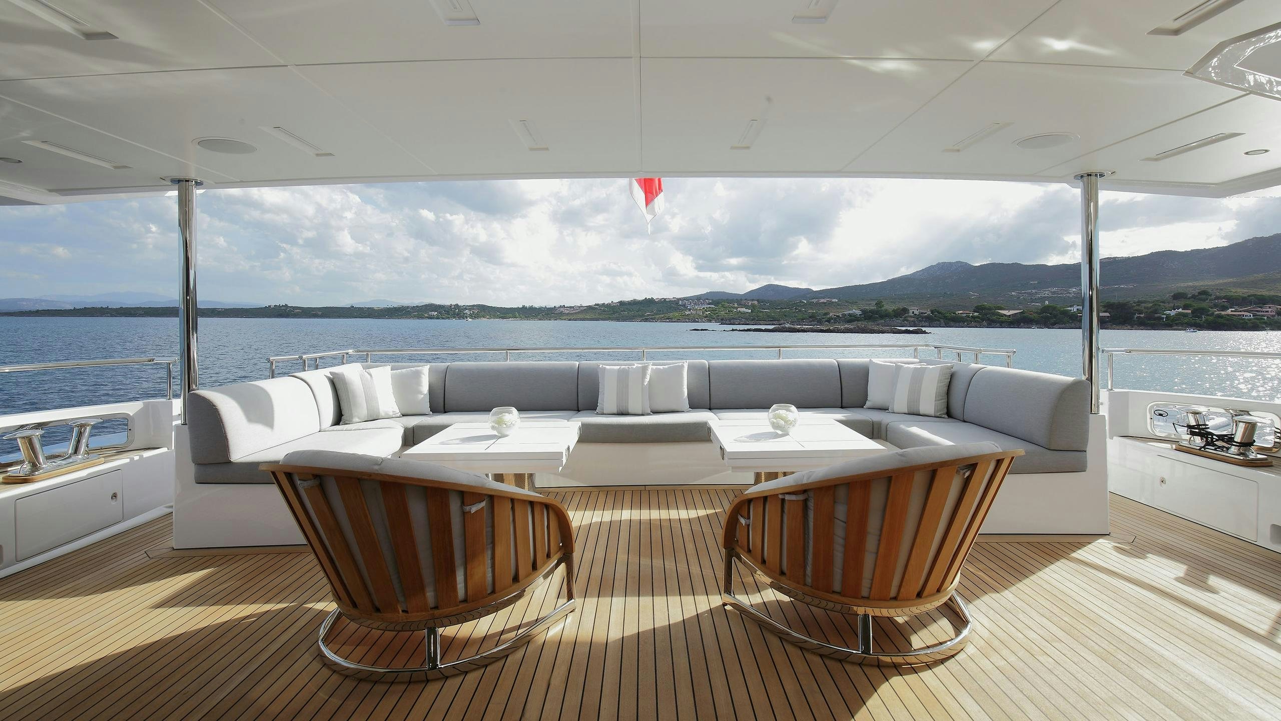 a large white boat on a deck aboard WILLOW Yacht for Charter