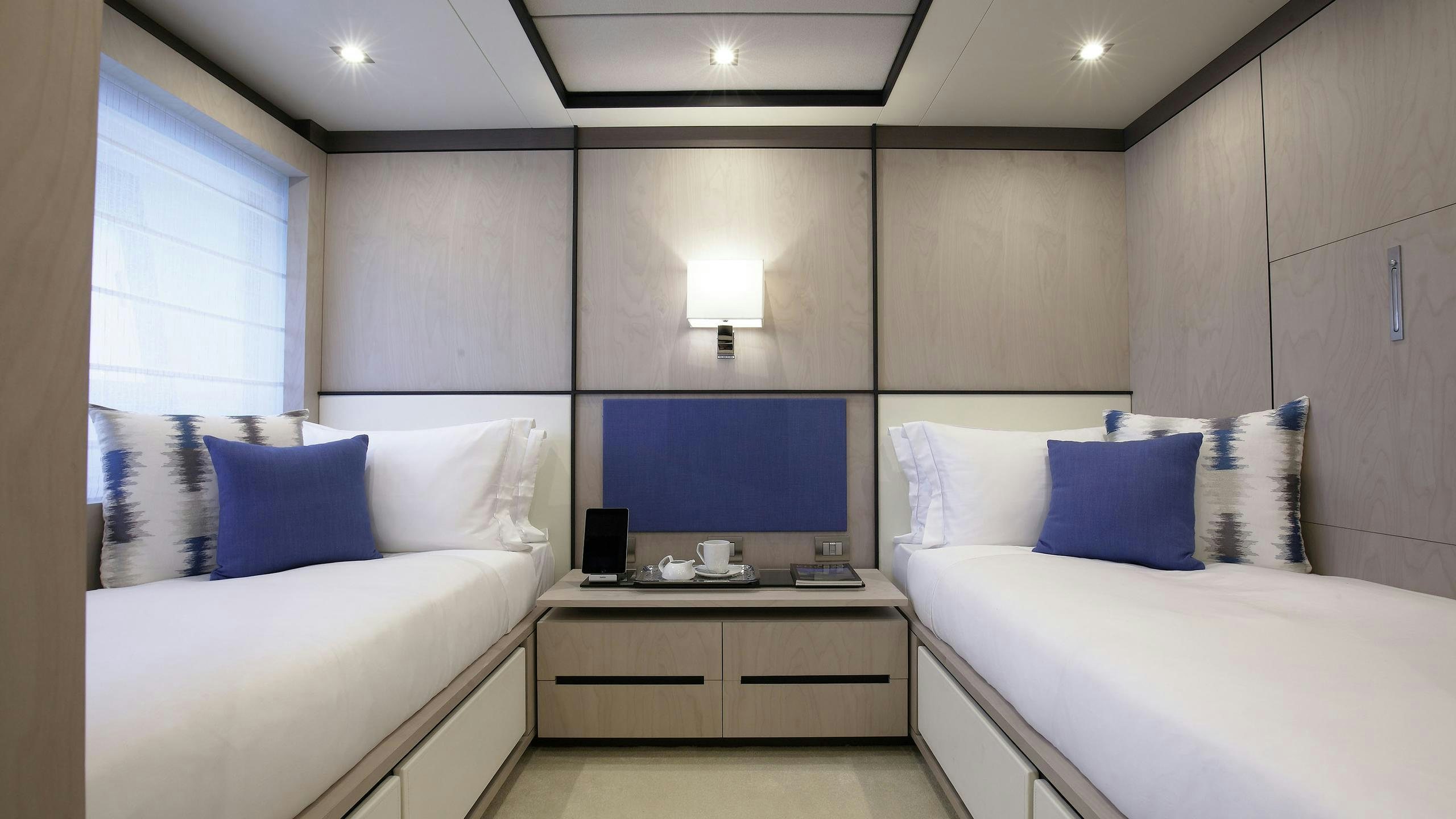 a room with two beds aboard WILLOW Yacht for Charter