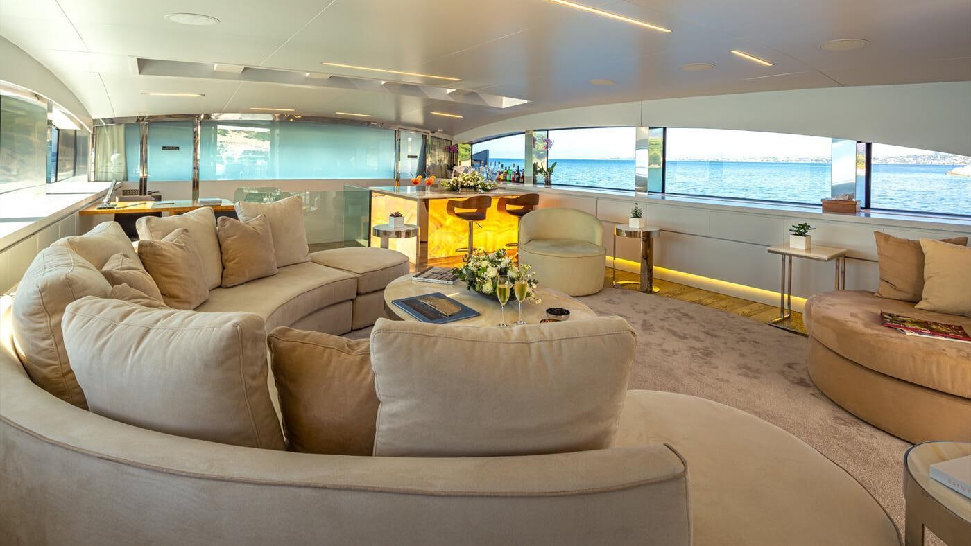 a living room with a large window aboard SEA WOLF Yacht for Charter