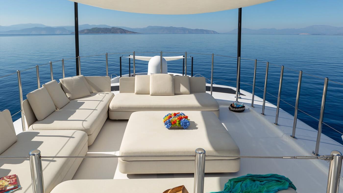 a white couch on a boat aboard SEA WOLF Yacht for Charter