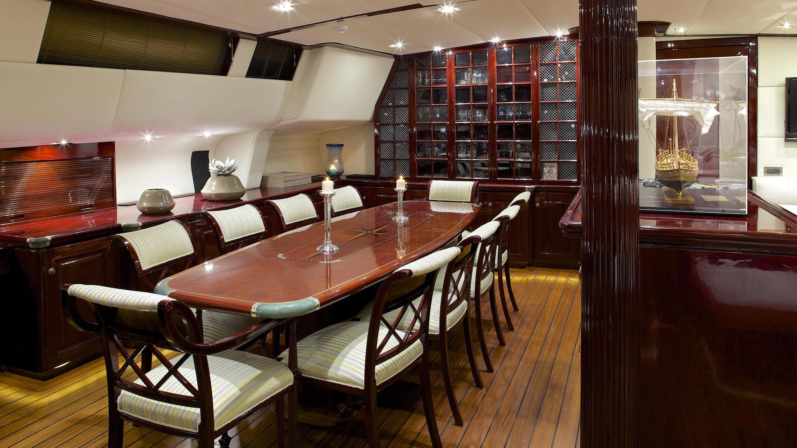a restaurant with a table and chairs aboard ALLURE A Yacht for Charter