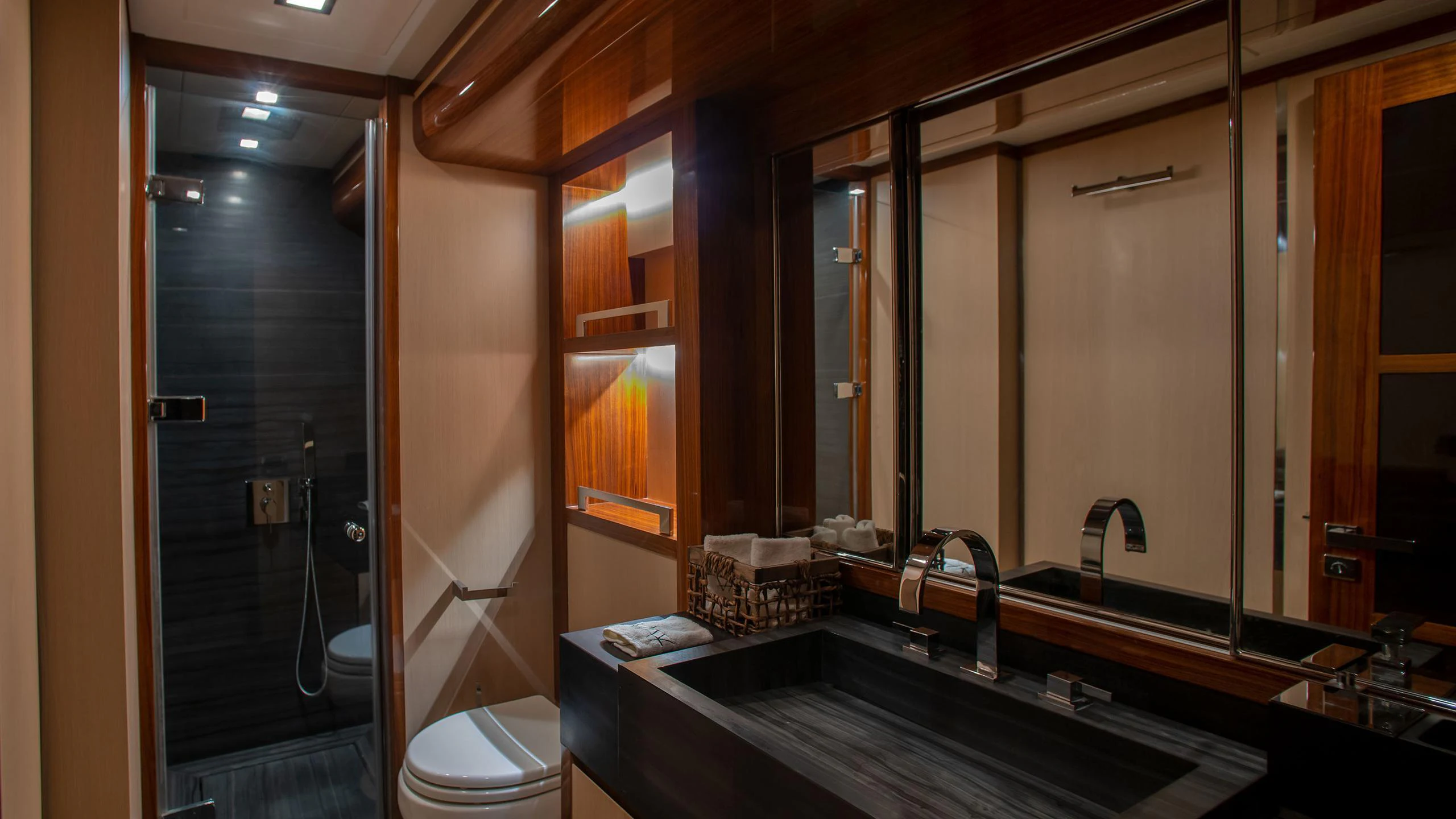 a bathroom with a sink and a toilet aboard VAY Yacht for Charter