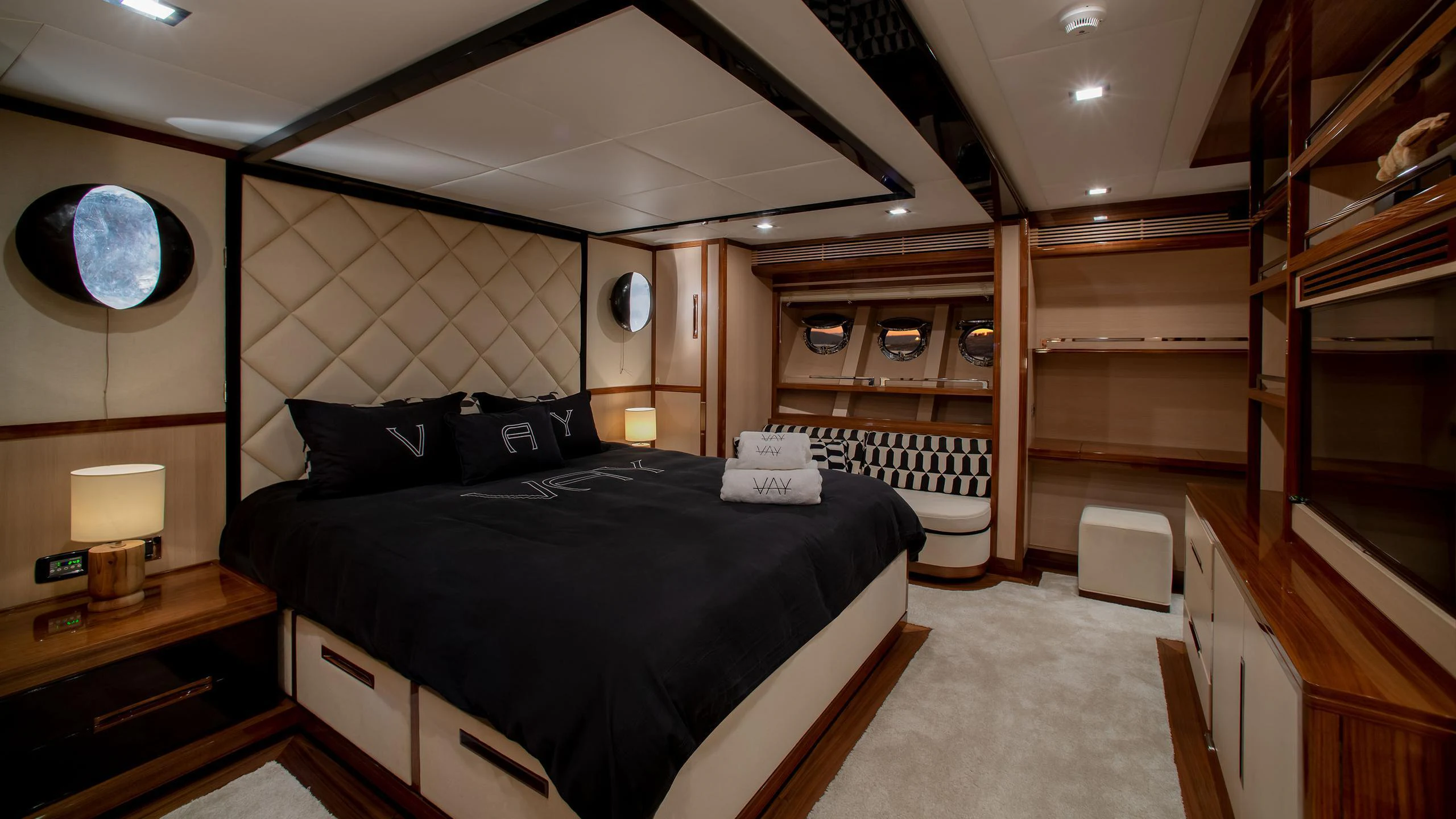 a bedroom with a large bed aboard VAY Yacht for Charter