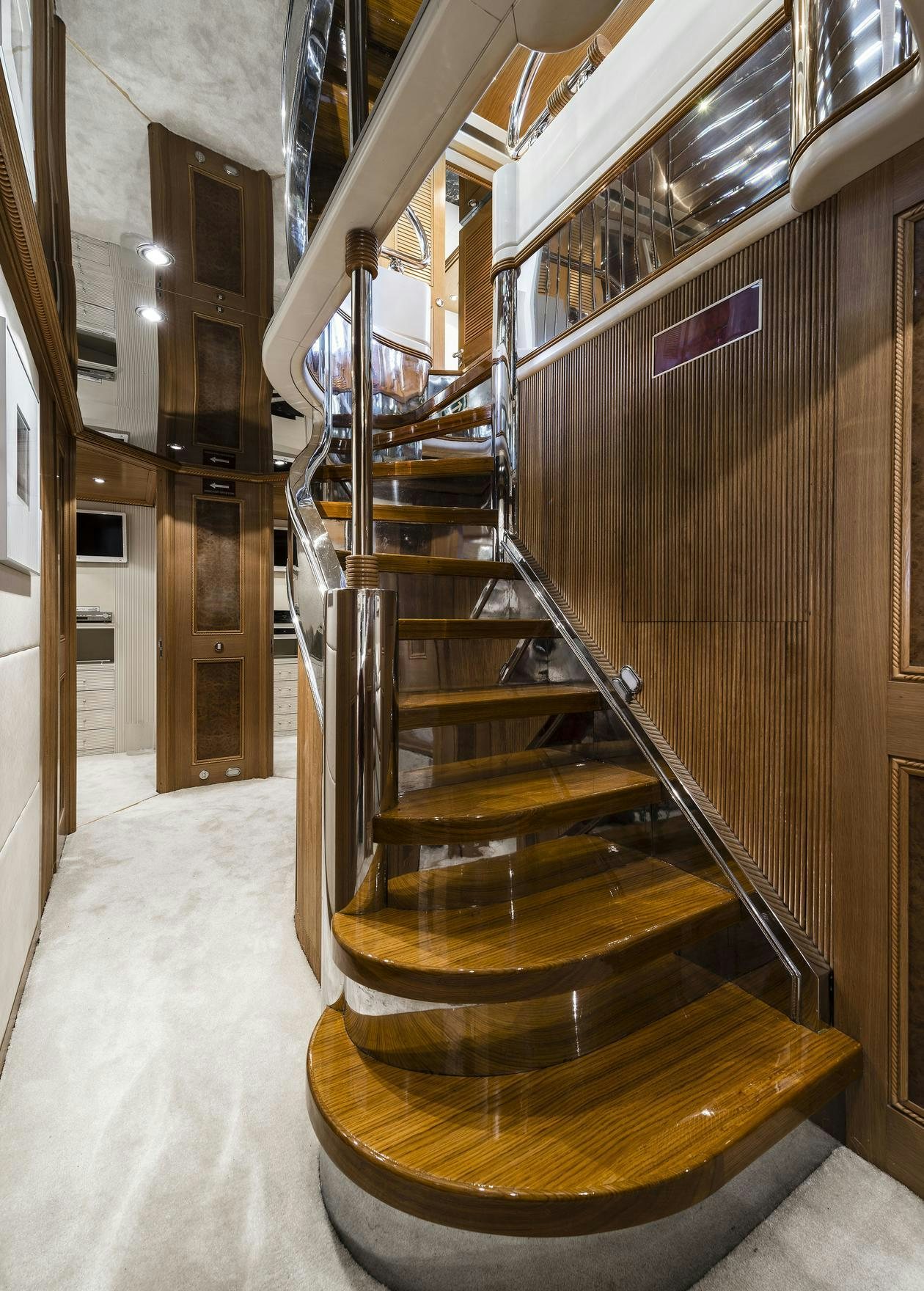 a staircase in a building aboard DESAMIS B Yacht for Charter