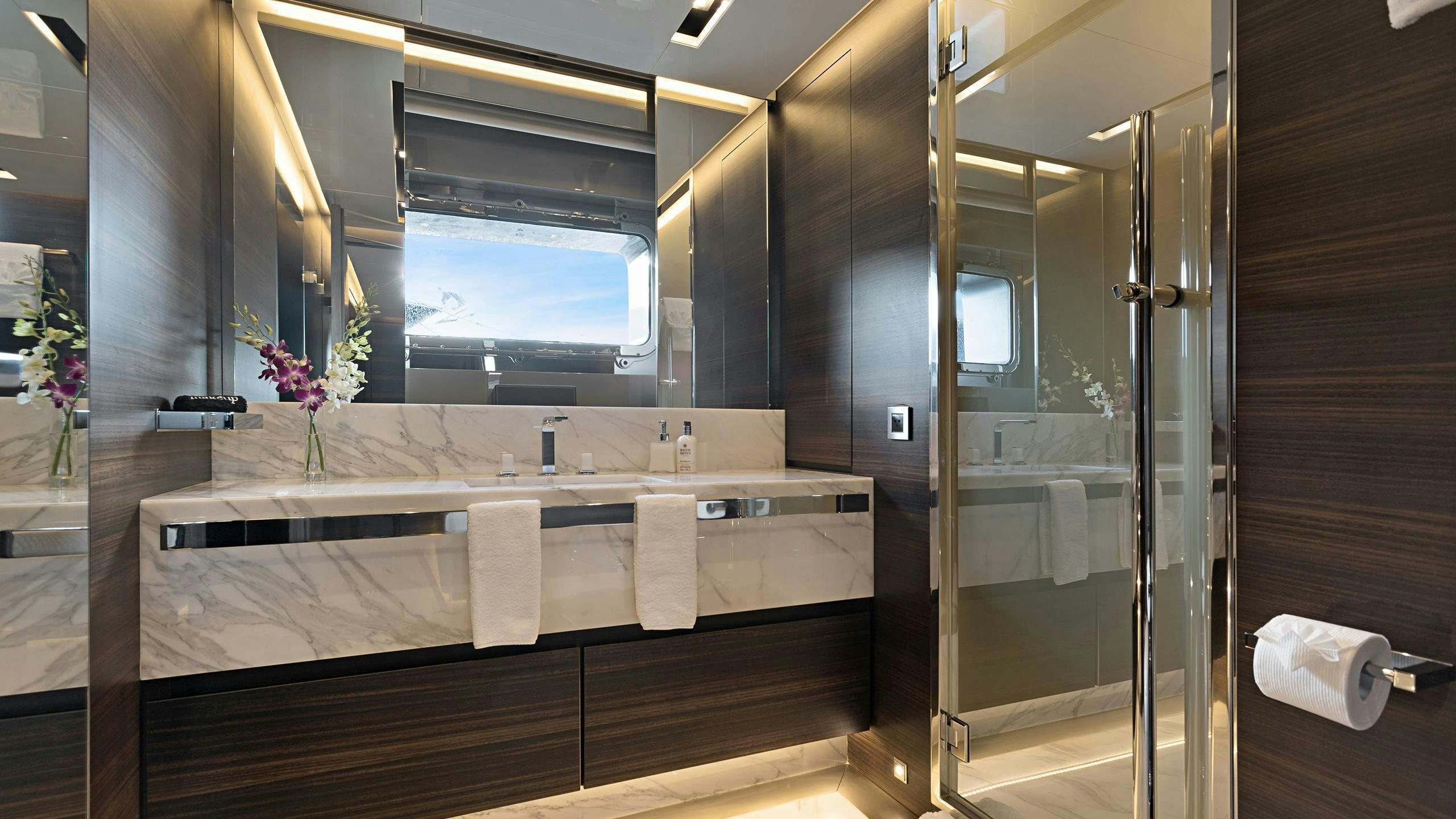 a bathroom with a large bathtub aboard SAFE HAVEN Yacht for Charter