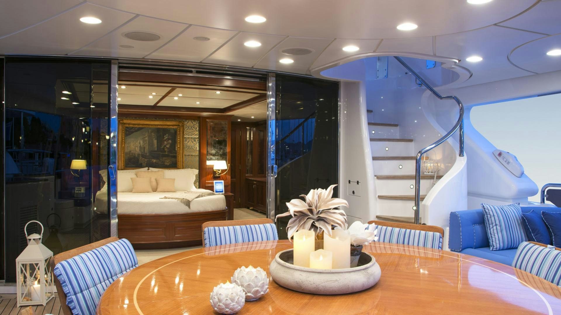a large room with a table and chairs aboard OPTION B Yacht for Charter