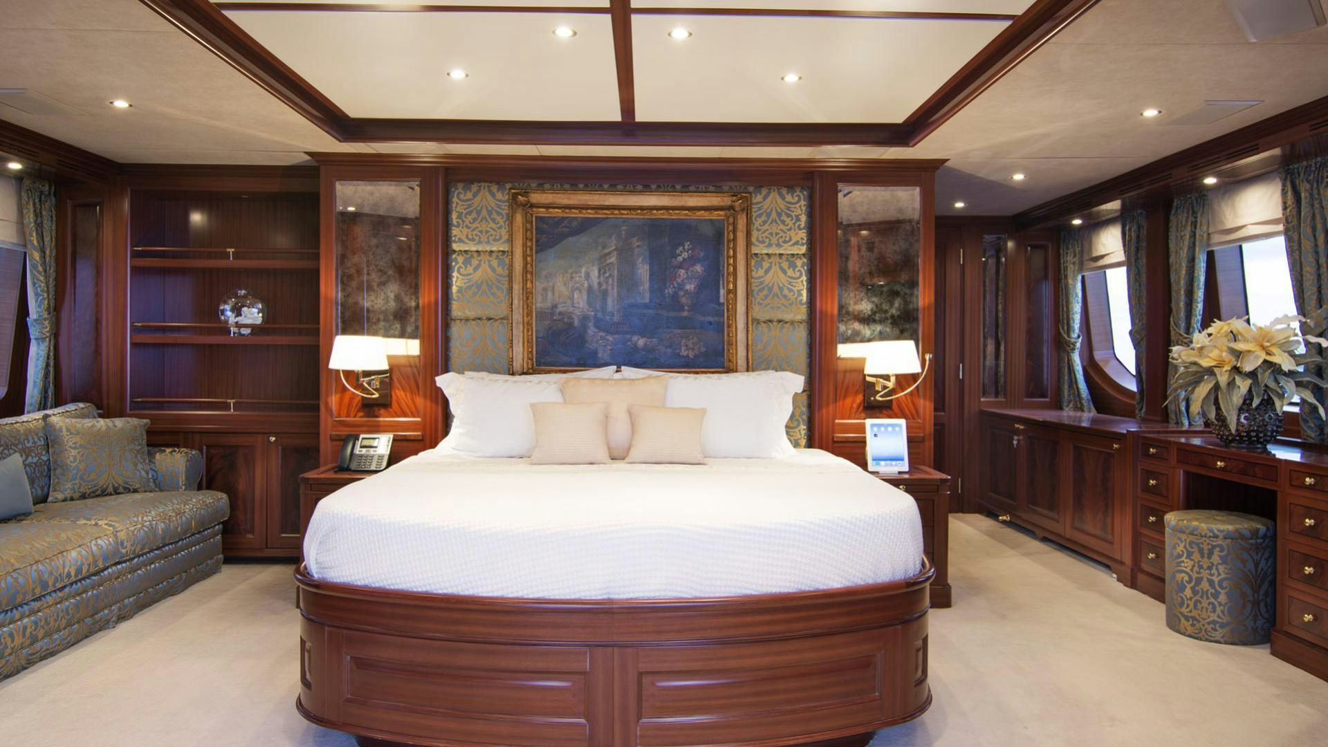 a large bed in a room aboard OPTION B Yacht for Charter