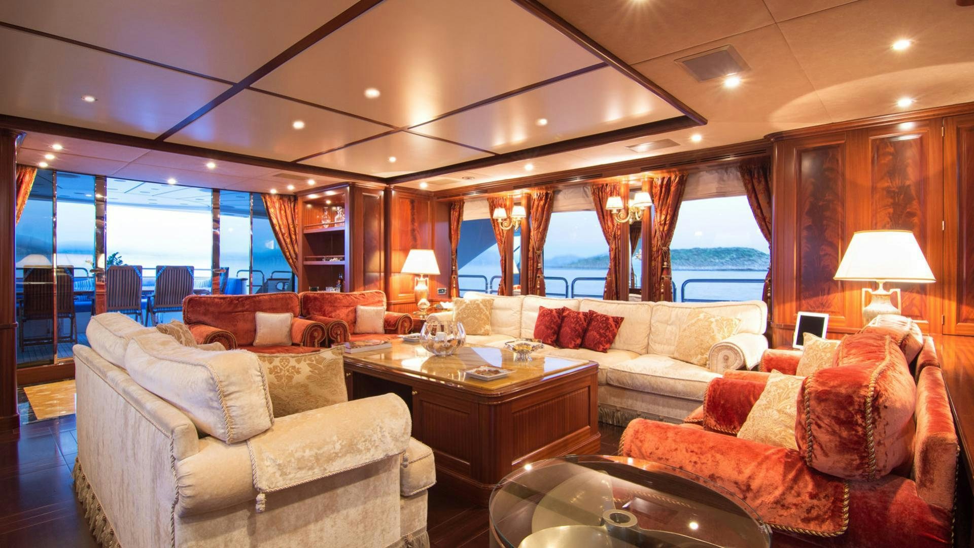 a living room with a large window aboard OPTION B Yacht for Charter