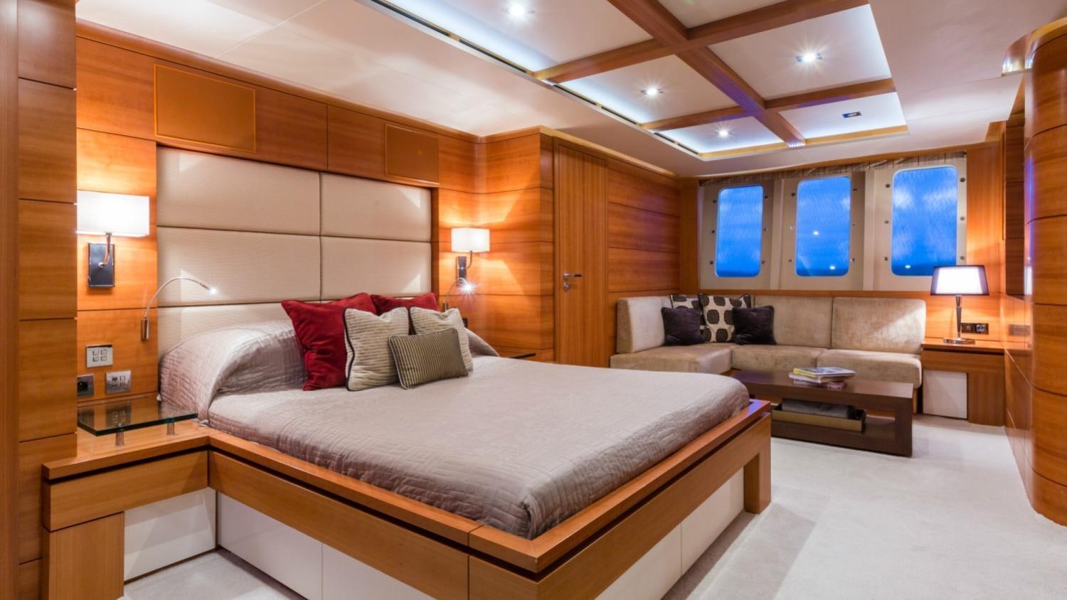 a large bed in a room aboard ARION Yacht for Charter