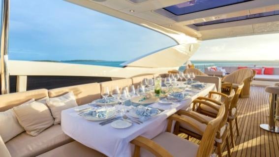 a dining room with a large table aboard ARION Yacht for Charter