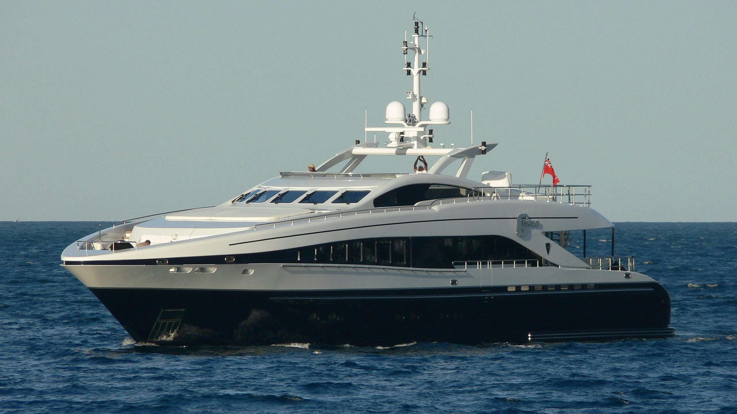 a large white yacht in the water aboard G-FORCE Yacht for Charter