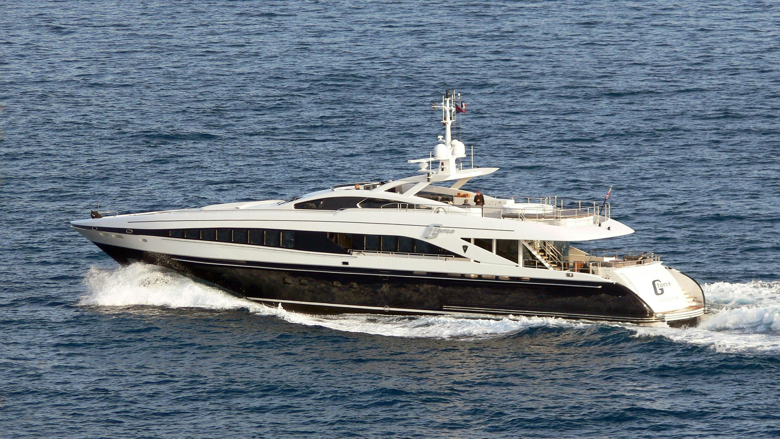 a large white ship aboard G-FORCE Yacht for Charter