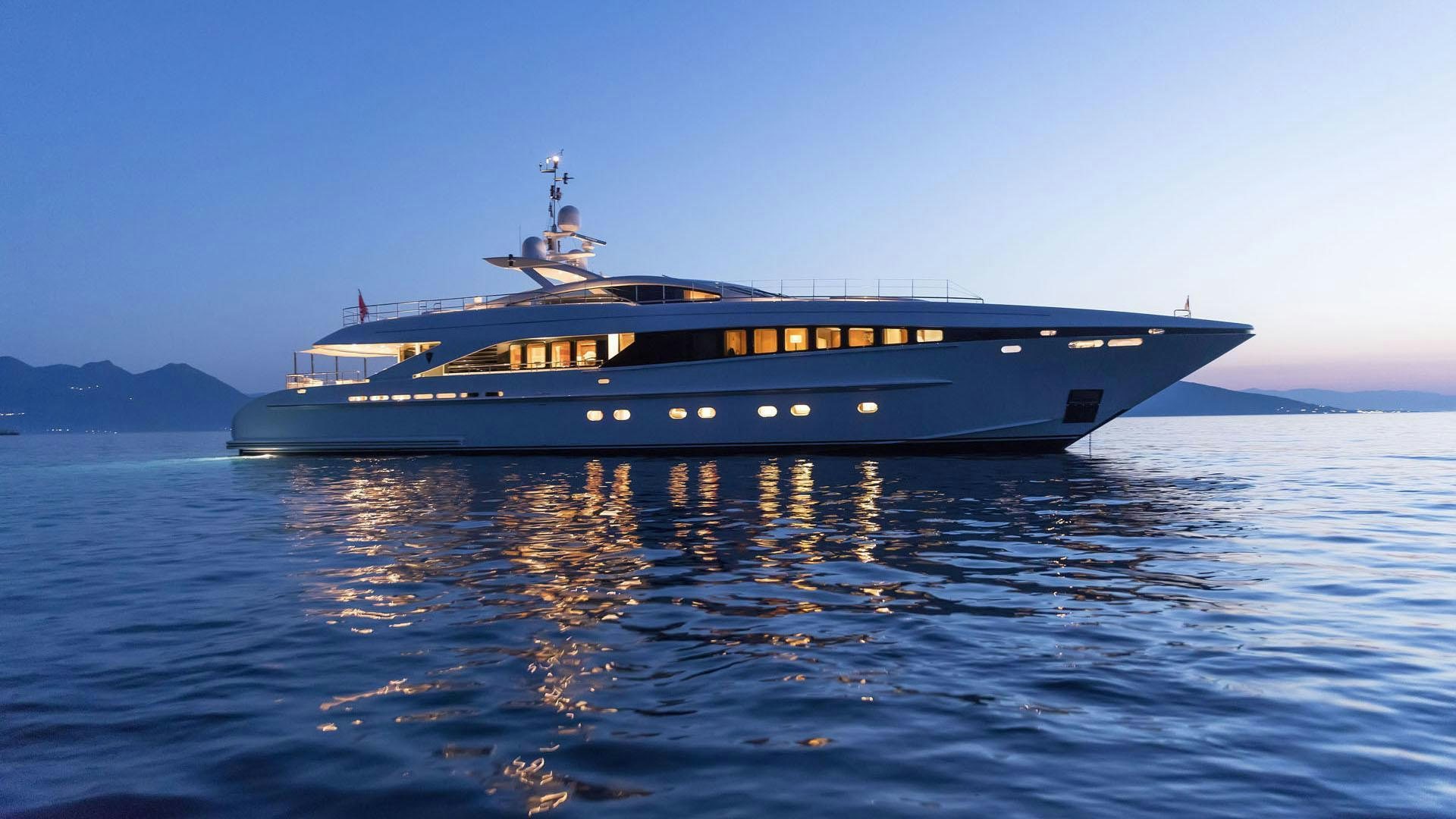 a large boat on the water aboard L'EQUINOX Yacht for Charter