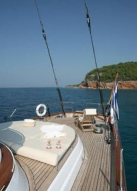 a boat on the water aboard GITANA Yacht for Charter