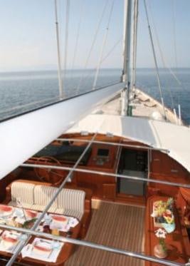 a boat on a deck aboard GITANA Yacht for Charter