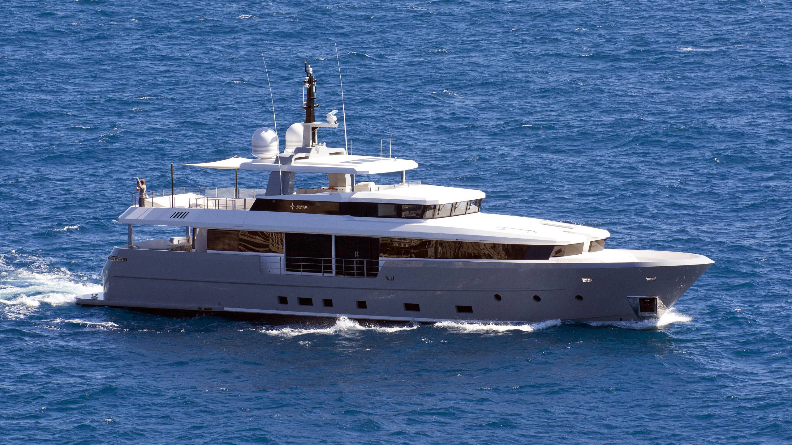 a white boat in the water aboard CINQUANTA-50 Yacht for Charter