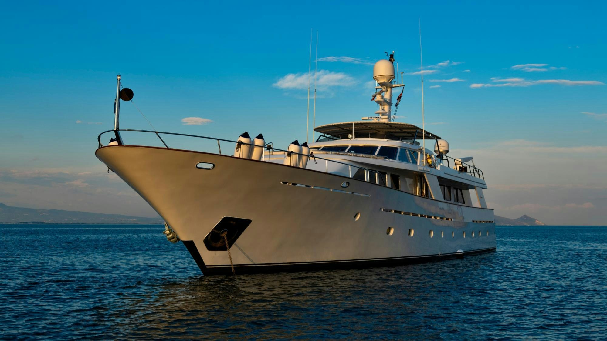 a large boat in the water aboard NIGHTFLOWER Yacht for Charter