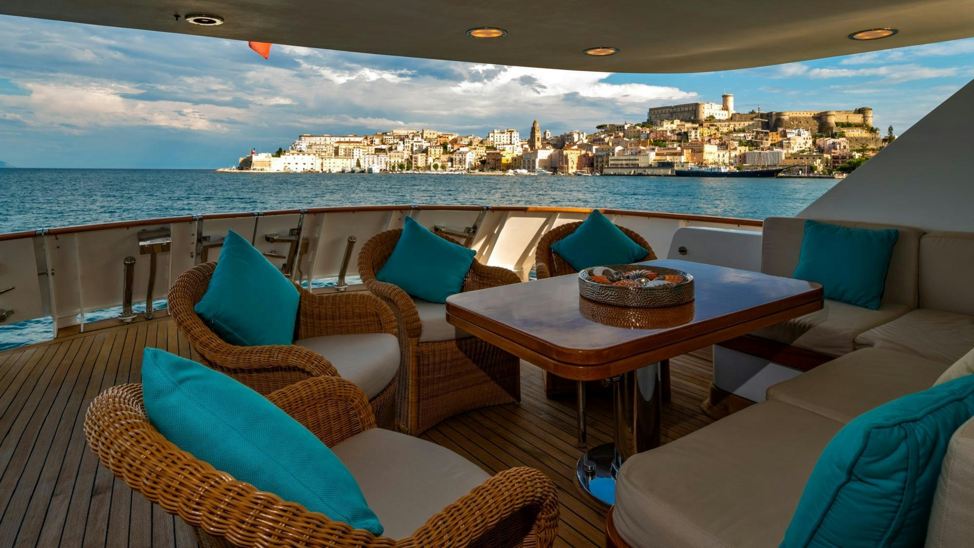 a room with a table and chairs aboard NIGHTFLOWER Yacht for Charter