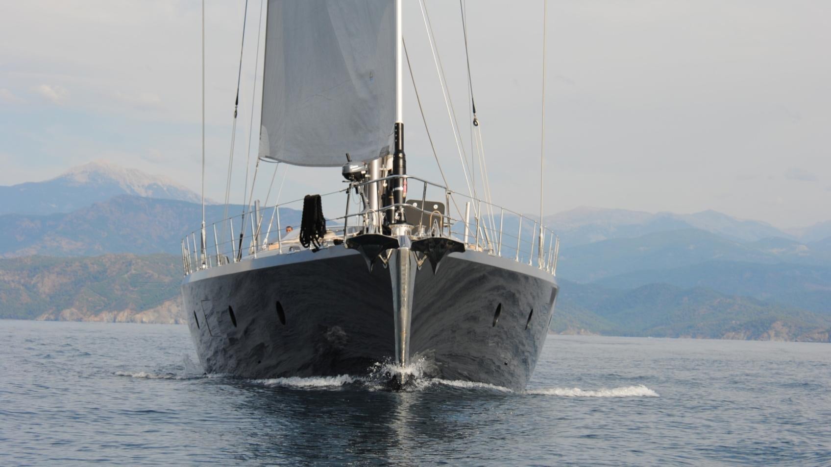 a large ship in the water aboard MUSIC Yacht for Charter