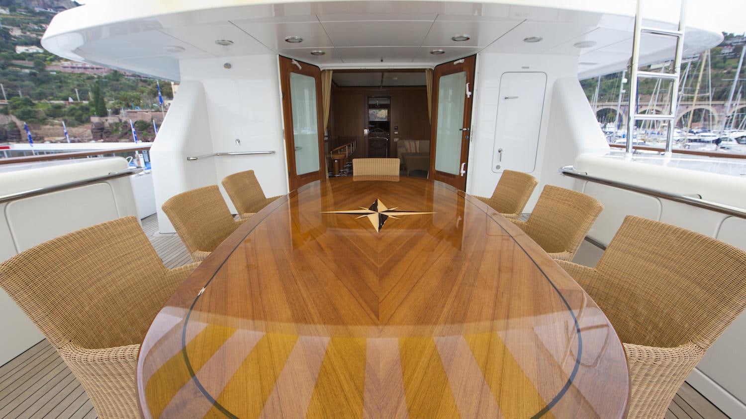 a room with a couch and a table and chairs aboard CORNELIA Yacht for Charter