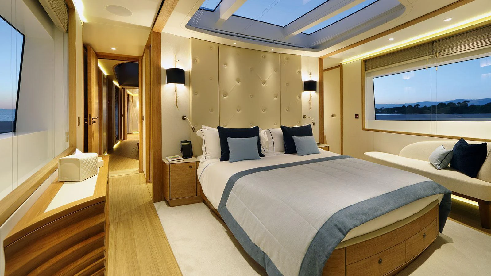 a room with a bed and a window aboard SOLIS Yacht for Charter