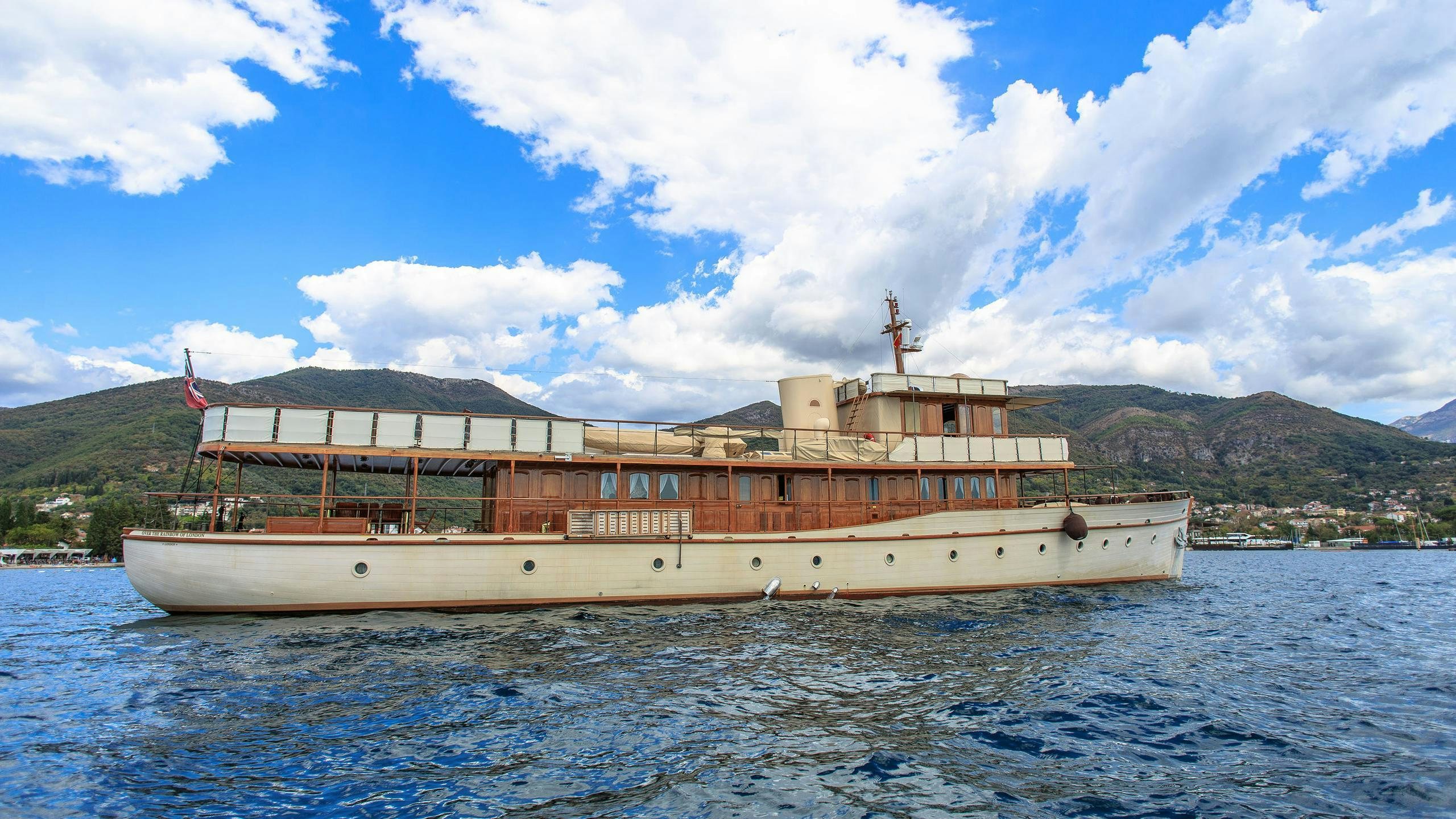 a large boat in the water aboard OVER THE RAINBOW OF LONDON Yacht for Charter