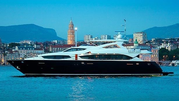 a large ship in the water aboard ARAGO Yacht for Charter