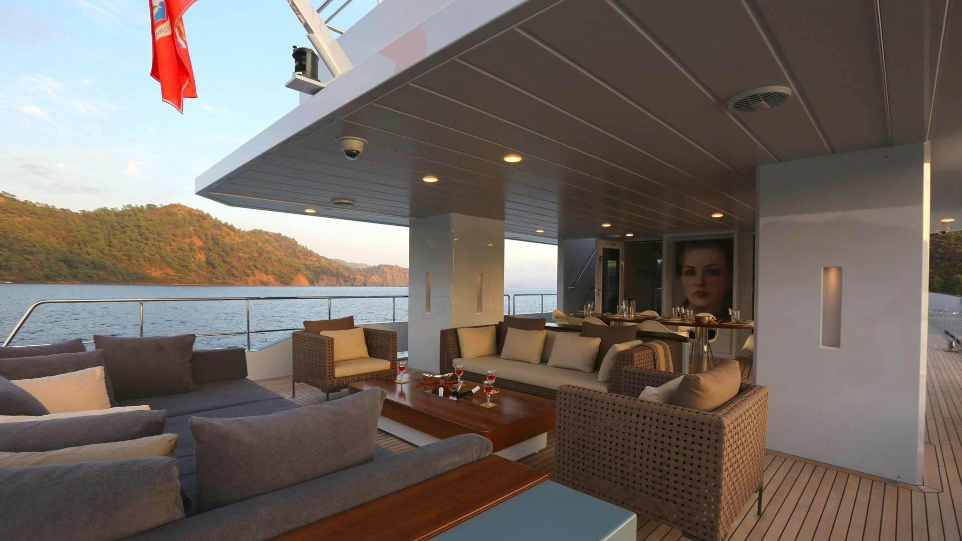 a living room with a large body of water aboard ONLY NOW Yacht for Charter