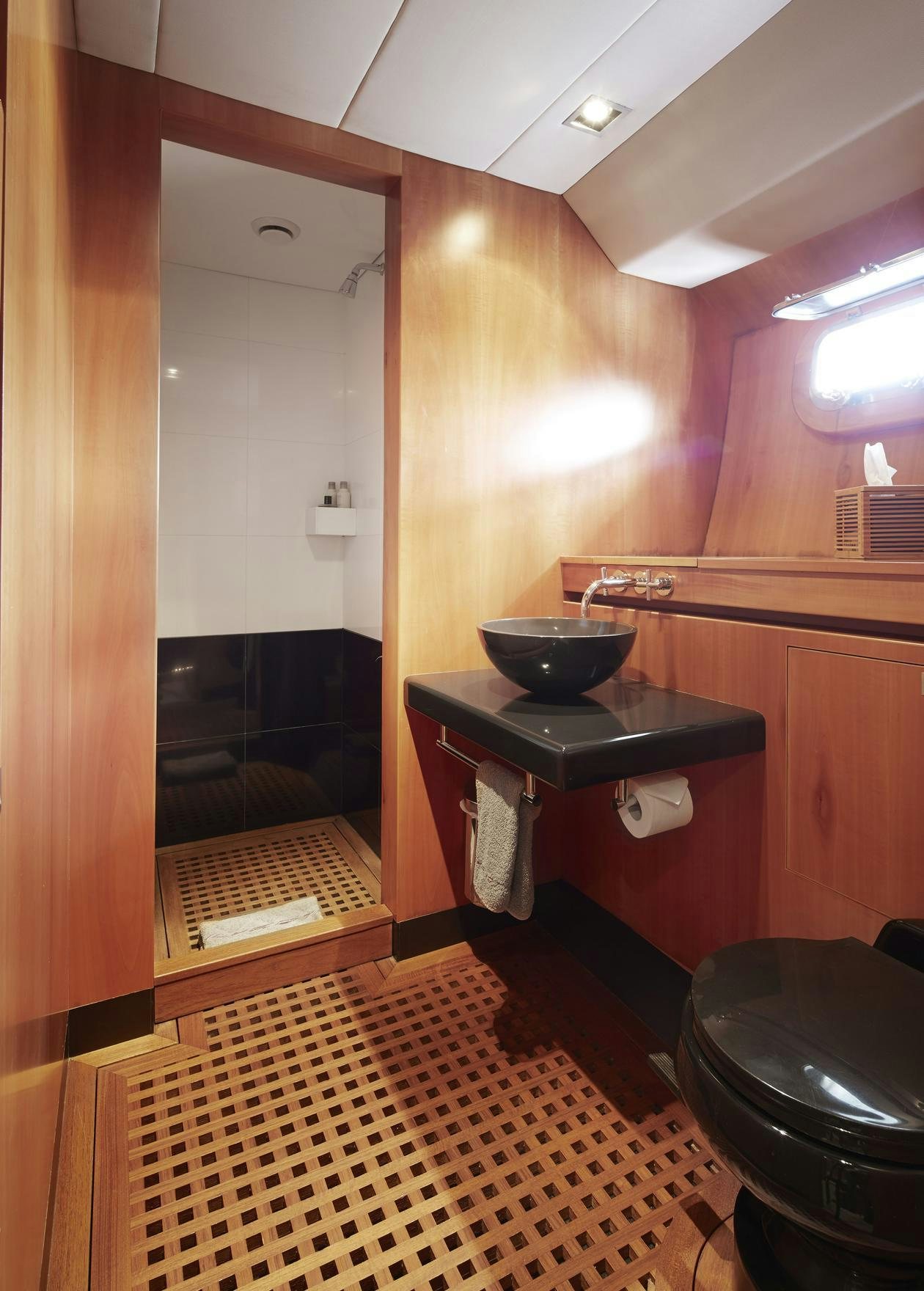 a bathroom with a sink and a mirror aboard SILVERTIP Yacht for Charter