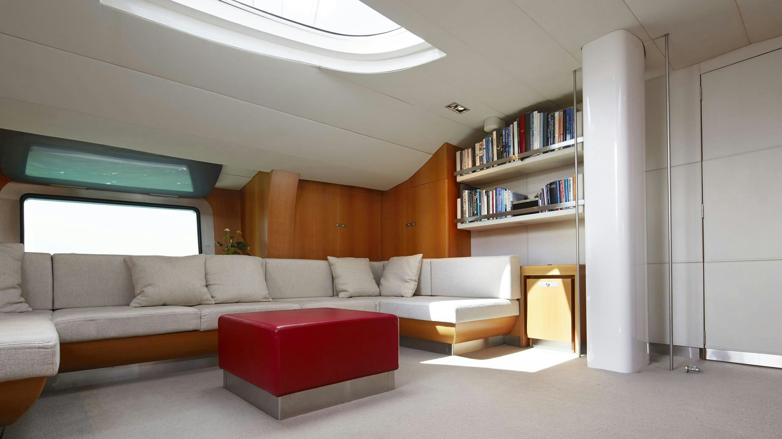 a living room with a white couch aboard SILVERTIP Yacht for Charter