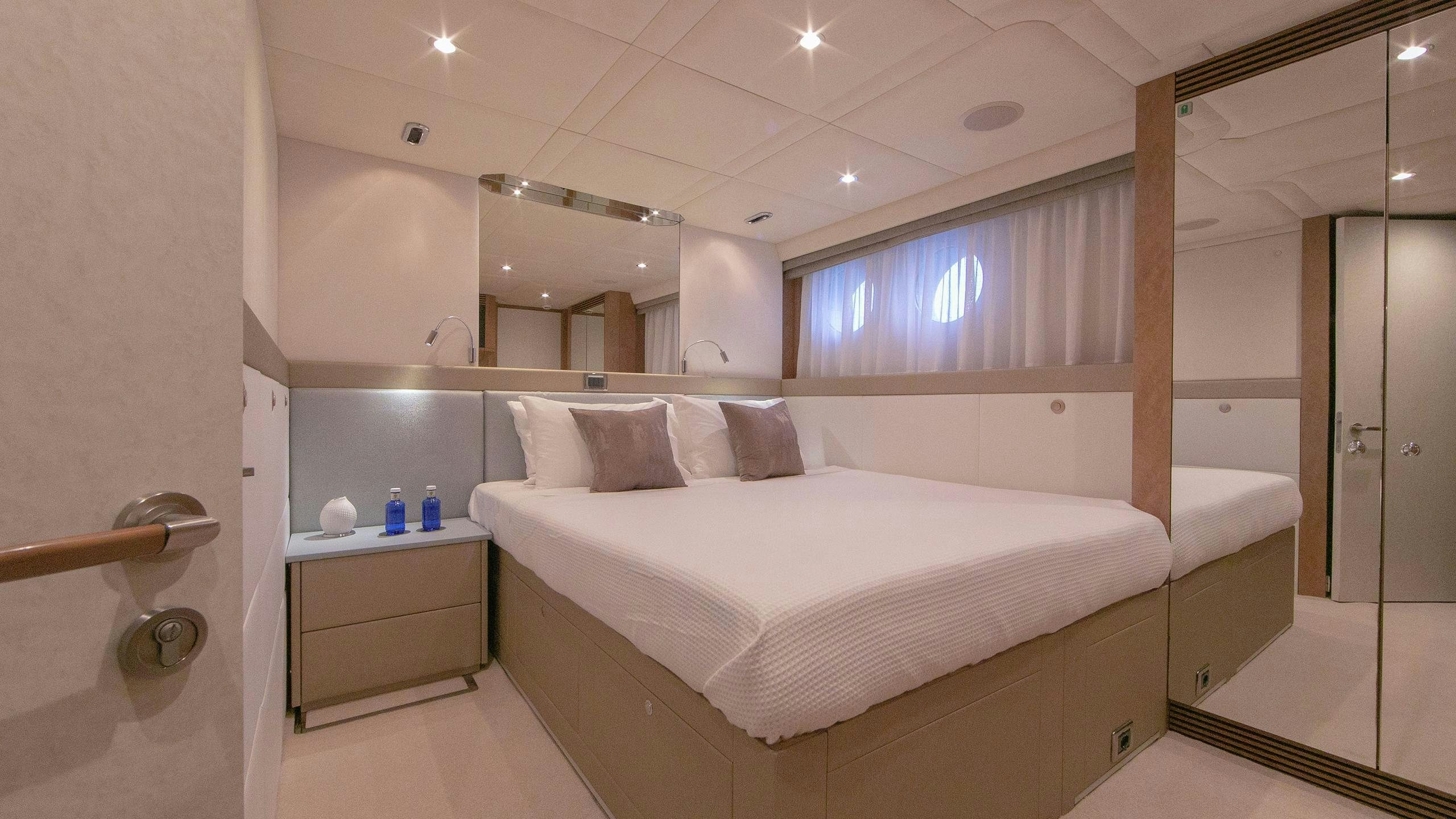 a large bed in a room aboard BENITA BLUE Yacht for Charter