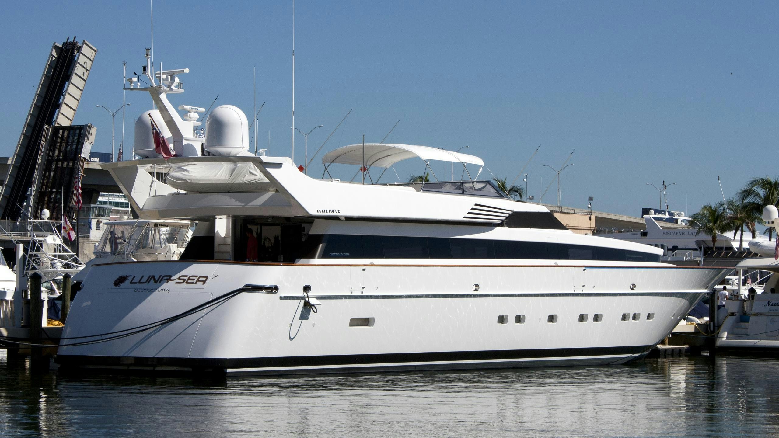 a white yacht docked aboard LUNASEA Yacht for Charter