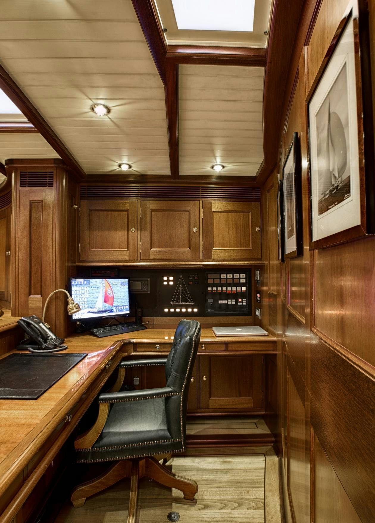 a room with a computer and a chair aboard SHAMOUN Yacht for Charter