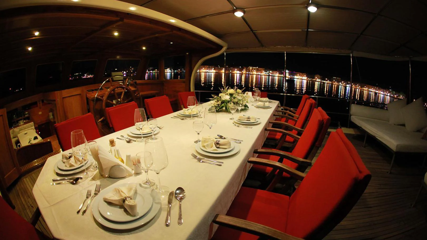 a table set for a dinner aboard JUNIOR ORCUN Yacht for Charter