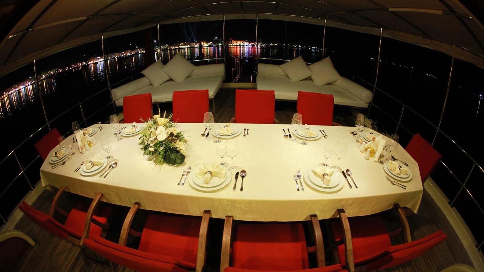 a table set for a banquet aboard JUNIOR ORCUN Yacht for Charter