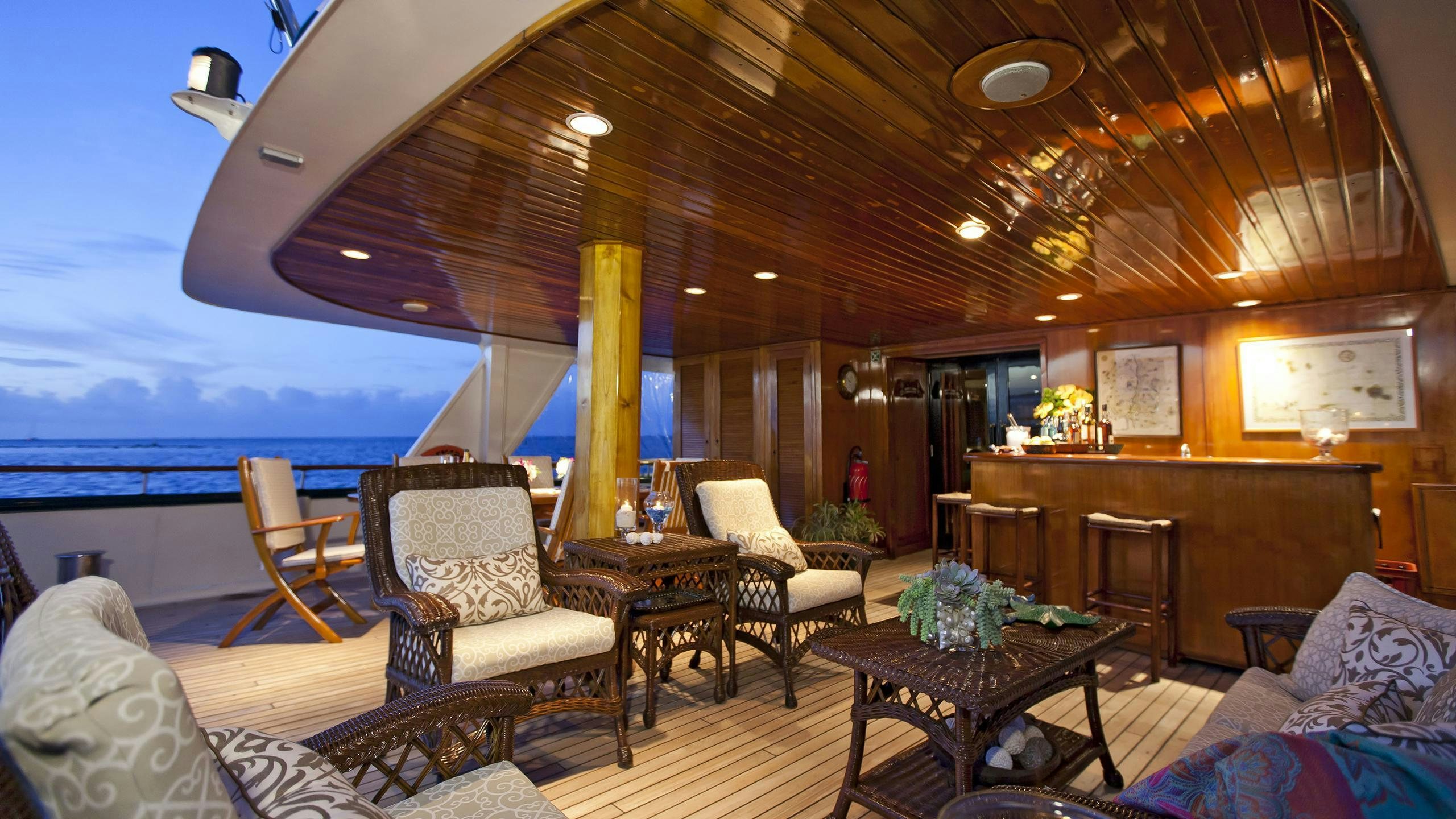 a large living room with a large balcony aboard ASKARI Yacht for Charter